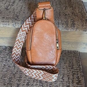Stylish Tan Sling Crossbody Bag with Patterned Strap